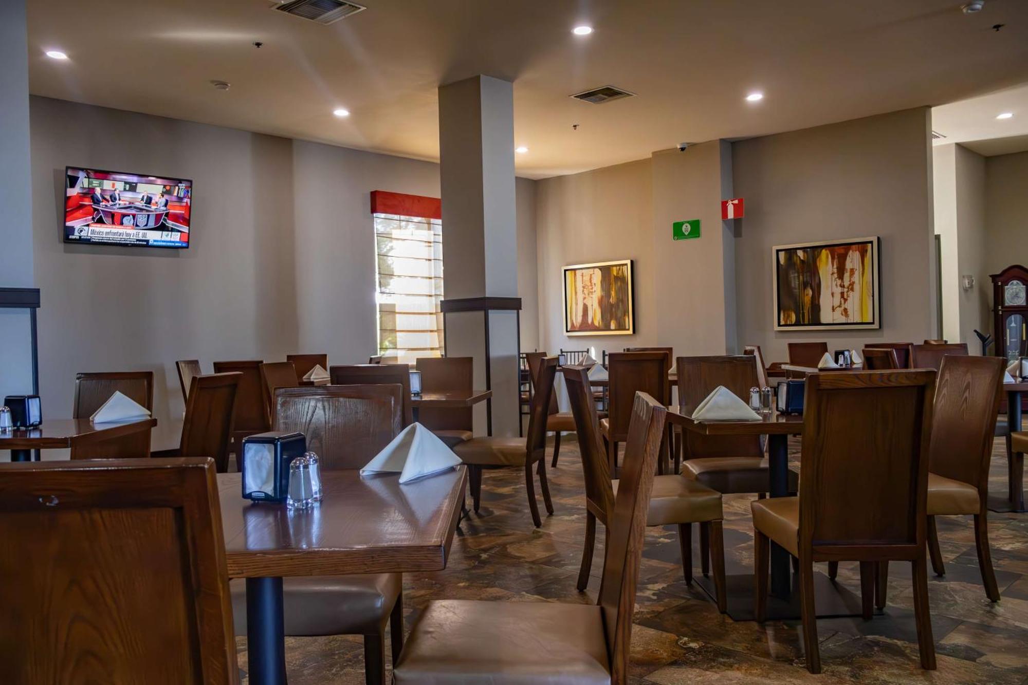 Best Western Premier Monterrey Aeropuerto Apodaca Zewnętrze zdjęcie The dining room at the restaurant